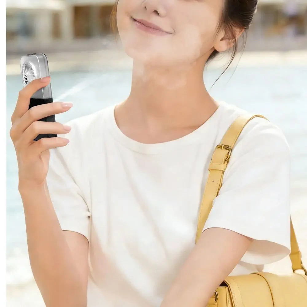 Portable Mini Handheld Mist Fan – Rechargeable Cooling Fan with Water Spray